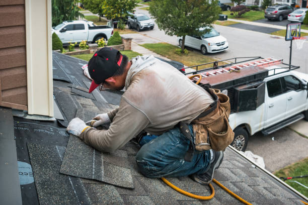 Professional Roofing technician working in Seymour, CT